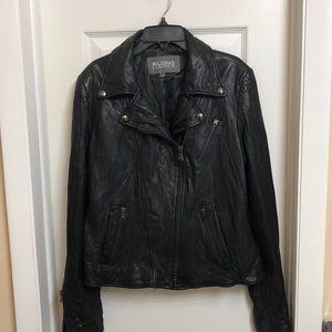 Wilson’s black leather jacket